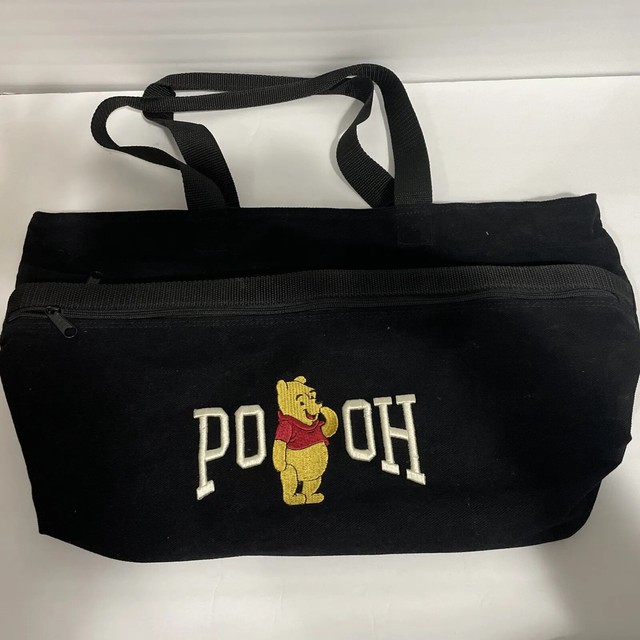 The Walt Disney Company POOH Embroidered Zipper Black Tote Bag. The Walt Disney Company POOH Embroidered Zipper Black Tote Bag.