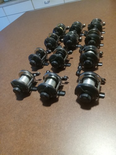 Lot Of 12 Crappie Max CX20 Baitcasting Reels W/ Line Jigging And Spider Rigging