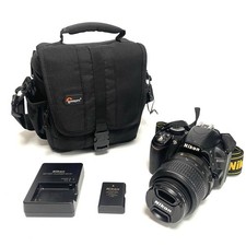Nikon D3100 DSLR Camera with 18-55mm Lens, Battery Charger, Strap Used