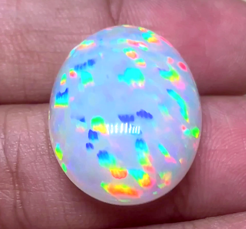 25.4ct Welo Opal Oval Cabochon AAAA Loose Prism Flash Ethiopian VIDEO - Picture 5 of 8