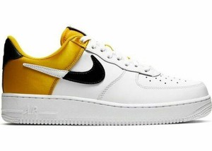 yellow white and black nikes