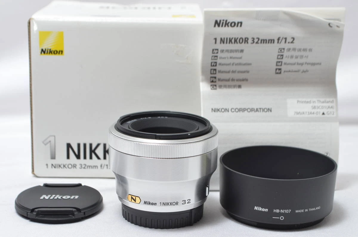 Nikon single focus lens 1 NIKKOR 32mm f/1.2 silver Nikon CX format only 4635