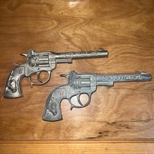 2 Vintage Star Toy Revolver Cap Gun Diecast Metal with Red Star  Bull on Handle