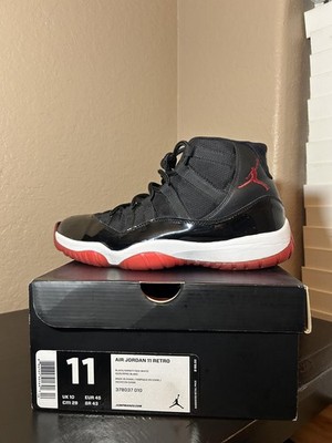Air Jordan 11 Retro Black/Varsity Red-White High Top Sneaker