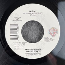 R.E.M. The Sidewinder Sleeps Tonite / The Lion Sleeps  45 Warner 7-18523 NEW REM