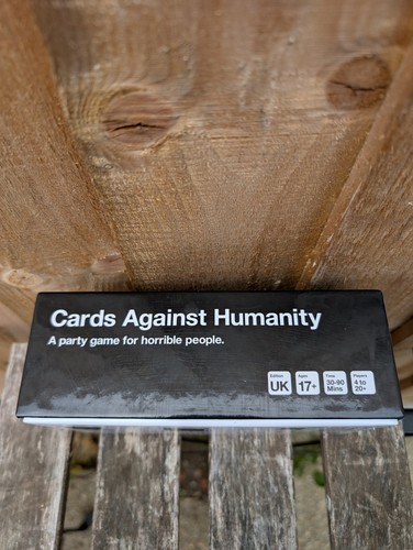 Cards Against Humanity - UK Edition - and First Expansion Pack - Picture 3 of 5