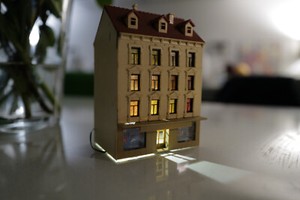 N gauge 1:160 Historic Apartment block with Fashion shop and light facility.