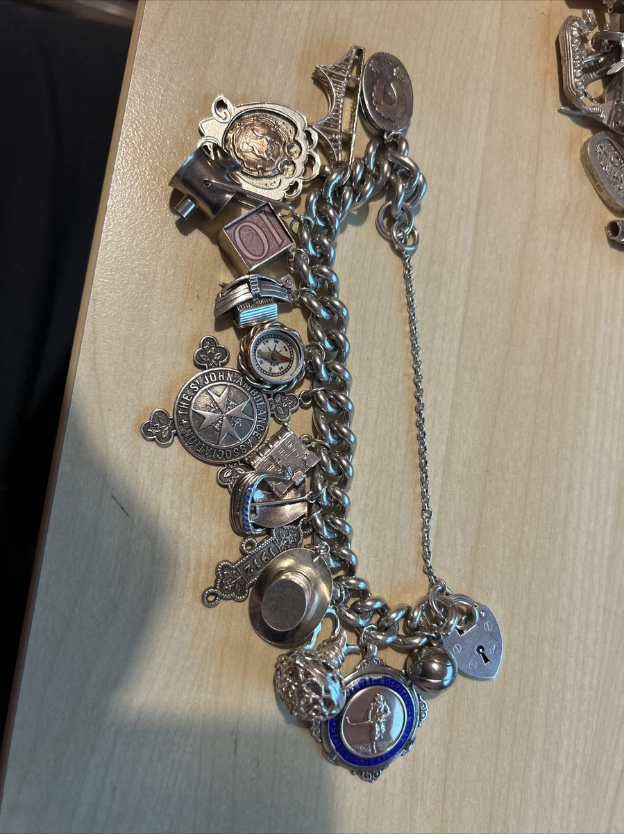 Heavy silver shop charm bracelet