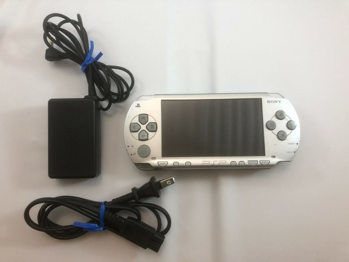 Sony PSP 1000 Silver Handheld System with Charger Sony PSP 1000 Silver Handheld System with Charger