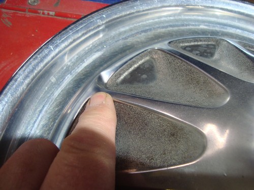 AMC hub caps, set of 4. Every one of them has some kind of curb bumps. See pic's - Picture 3 of 11