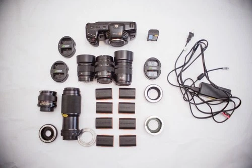 Blackmagic Pocket Cinema Camera4K & 3 Lumix Lenses & M42/FD Adapters & Chargers