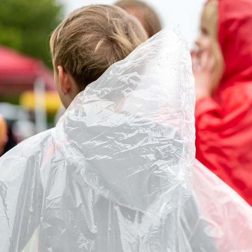 Juvale 20-Pack Disposable Rain Ponchos for Kids - Emergency Raincoats with Hood - Picture 5 of 7