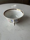 Porcelain teacup by Vista Alegre, handpainted with floral design and gold trim — photo 6