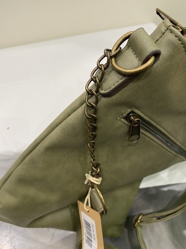 New With Tags Zoe Blu Crossbody Pocketbook olive green color. Adjust Strap - Picture 6 of 7