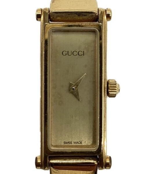 Montre femme GUCCI 1500 quartz cadran doré analogique fabrication suisse rectangle du Japon
