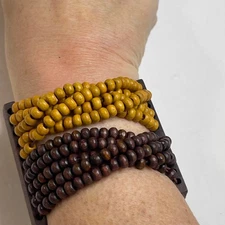 boho tribal beaded bracelet costume jewelry brown and gold wooden accents 