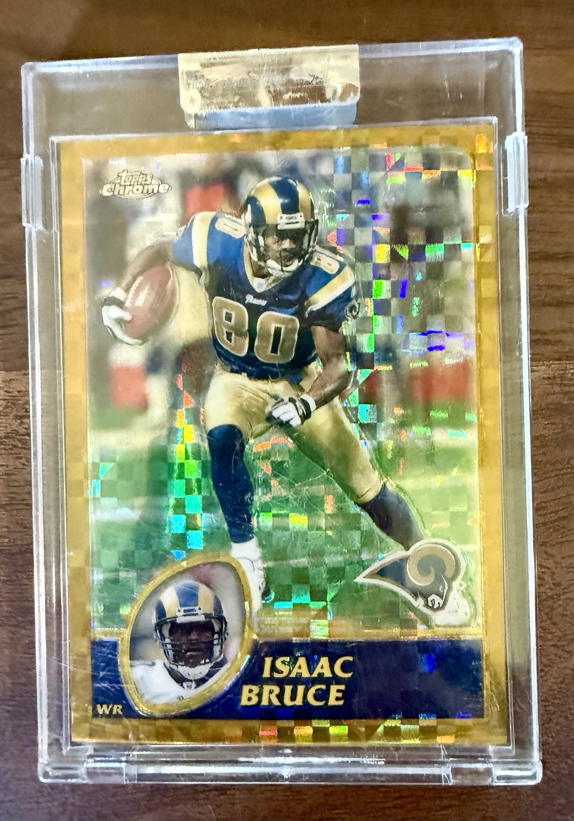 2003 Isaac Bruce Topps Chrome Uncirculated Gold X-Fractor /101 RAMS