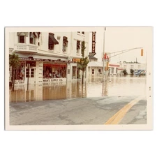 Color Photograph of Flooded Street at Going Out of Business Sale - 1972 Snapshot