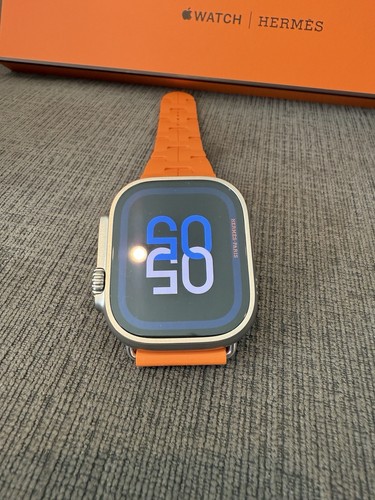 Apple Watch Hermès Ultra 2 titane 49 mm et neuve simple tour kilim orange - Photo 8 sur 21