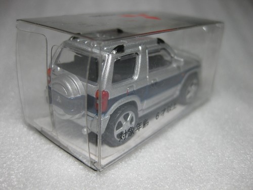 Coche diecast Mitsubishi Pajero Mini plateado y azul 2012 1:64 promoción nuevo en caja - Imagen 3 de 3