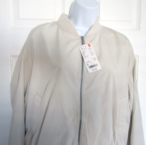 Giacca a vento Uniqlo donna taglia Med leggera zip nylon outdoor confezionabile panna nuova con etichetta - Foto 11 di 12