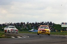 Robb Gravett Trakstar Motorsport Ford Sierra Sapphire leads Nick B 1991 Photo