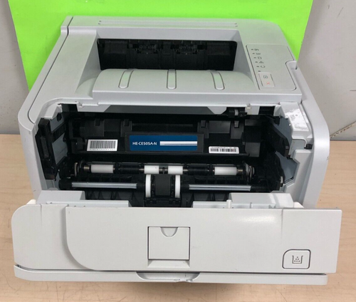 HP LaserJet P2035N Printer 101,171 PAGES (TESTED) HAS A TEAR IN THE FRONT LID - Picture 4 of 9