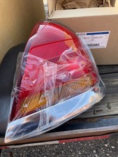 1998 - 2005 FORD CROWN VICTORIA TAIL LIGHT RH NOS OEM 3W7Z-13404-CA NEW!