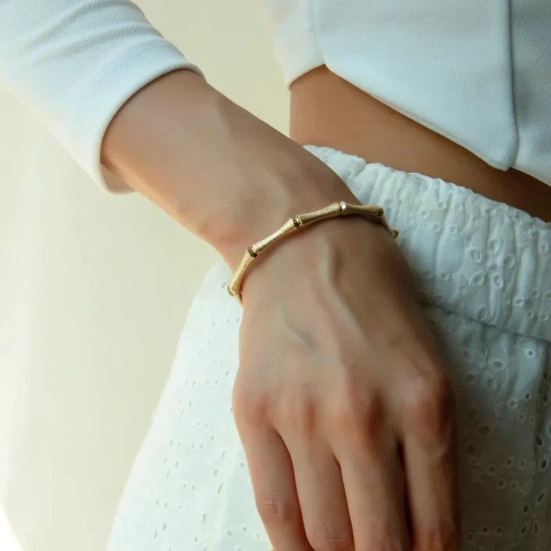 Bracelet ancien et succession en or jaune 18 carats sur style bambou empilabl... - Photo 2/4