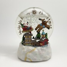 Led light up santa and sleigh snow globe