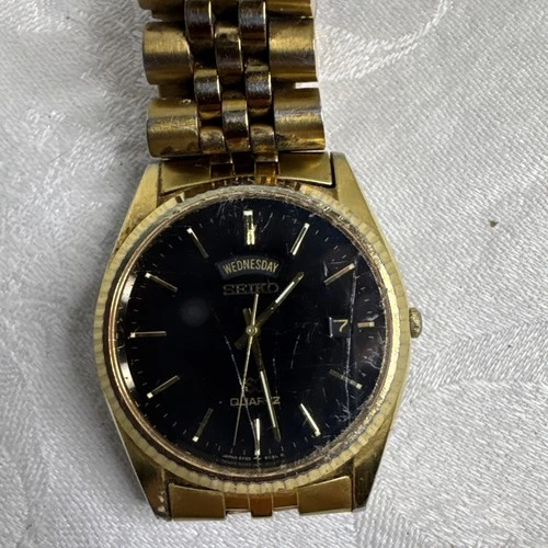 Vintage Seiko SQ 5Y23-8A69 Day Date Quartz Watch With Black Dial, gold tone