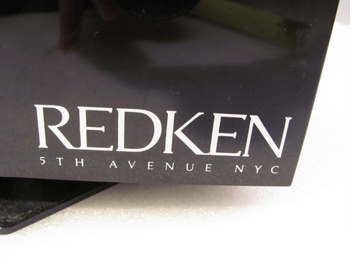 Champú de ducha de plástico con soporte de cosméticos giratorio para baño Redken - Imagen 8 de 11