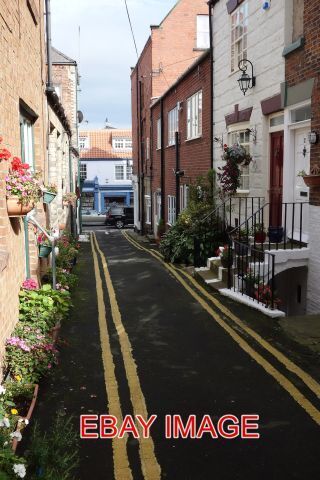 PHOTO ROUTH WALK VIEW DOWN ROUTH WALK WHITBY TOWARDS HOLMANS BOOKSHOP ON SKINNE - Picture 1 of 1