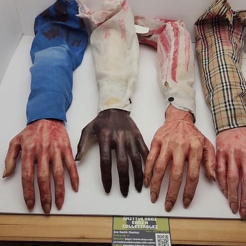 Halloween Props-Realistic Latex Bloody Severed Arms w/Shirt Sleeve (4 pc. Bundle - Video 1 of 1