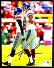 MARIO MANNINGHAM SIGNED 8X10 PHOTO - (Beckett) Pictured w/Eli Manning Giants