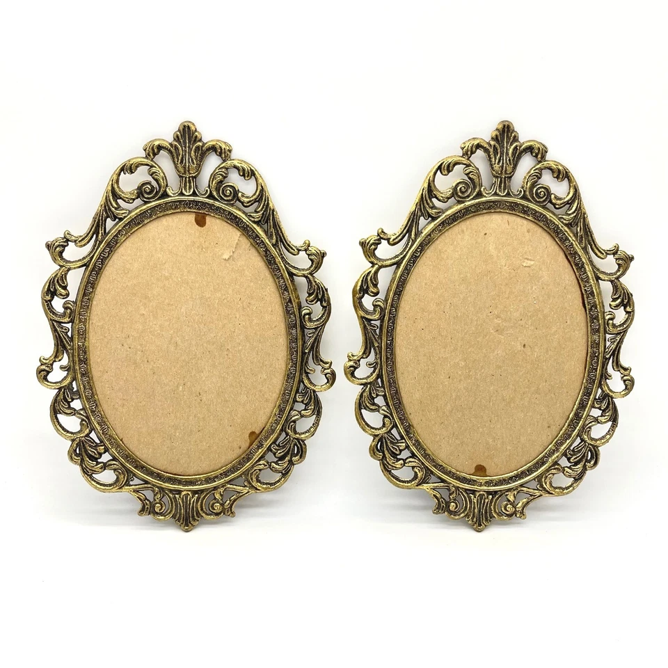 Juego de 2 marcos de fotos ovalados ornamentados de colección con pergaminos ornamentados en tono dorado Foto 2 de 4