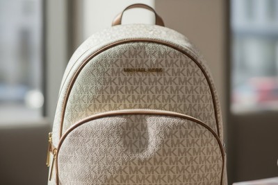 Michael Kors Beige Logo Backpack with Brown Leather Trim Michael Kors Sheila Medium Brown PVC Front Pocket Bookbag  main image 2