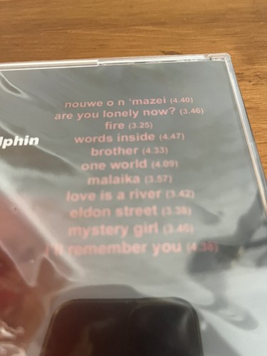 Junge auf einem Delphin, Worte im Inneren CD NEU - Bild 3 von 3