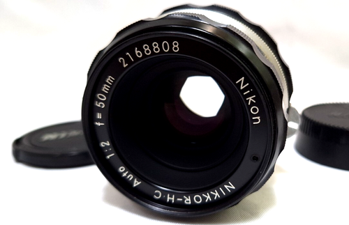 Nikon Nikkor-H Auto 50mm f/2 Nippon Kogaku Lens with sky filter