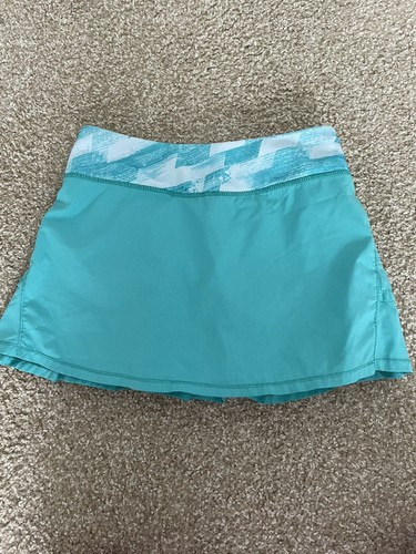IVIVVA By Lululemon Set the Pace Pleated Skirt Skort teal girls size 12 - Picture 1 of 2