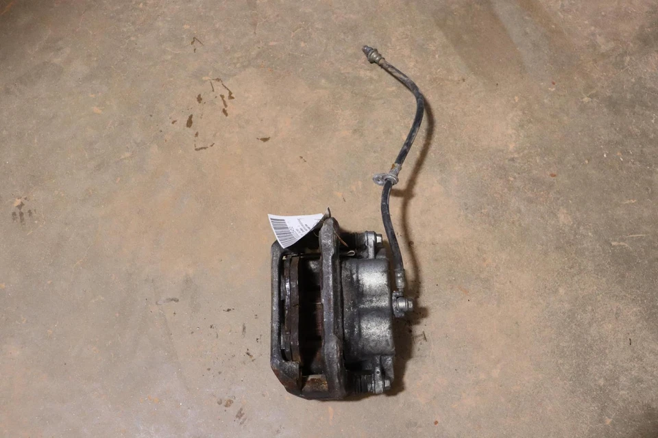 Pinza de freno delantera izquierda Honda Odyssey 2011-2017 con manguera OEM Foto 2 de 4