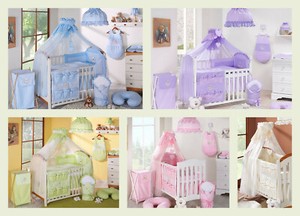 swinging crib with drapes