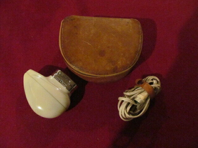 VINTAGE NORELCO MEN'S ELECTRIC SHAVER W/ORIGINAL ZIPPERED VINTAGE NORELCO MEN'S ELECTRIC SHAVER W/ORIGINAL ZIPPERED
