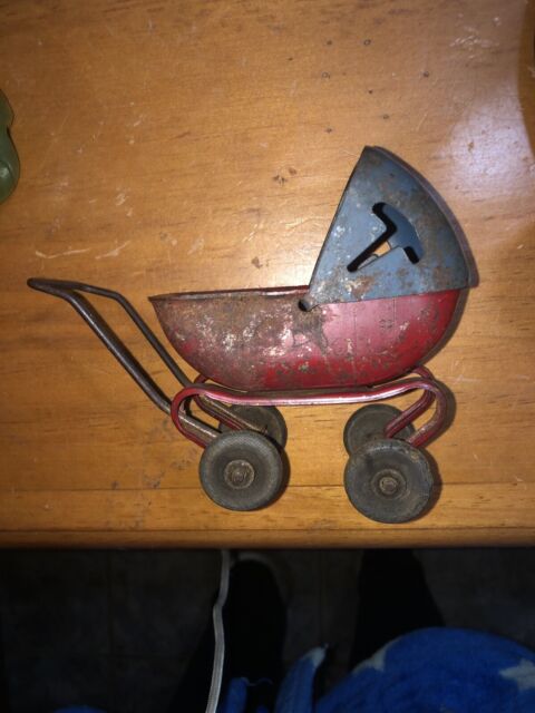 Vtg Wyandotte steel Metal Baby Doll Buggy Carriage red green rotates Vtg Wyandotte steel Metal Baby Doll Buggy Carriage red green rotates