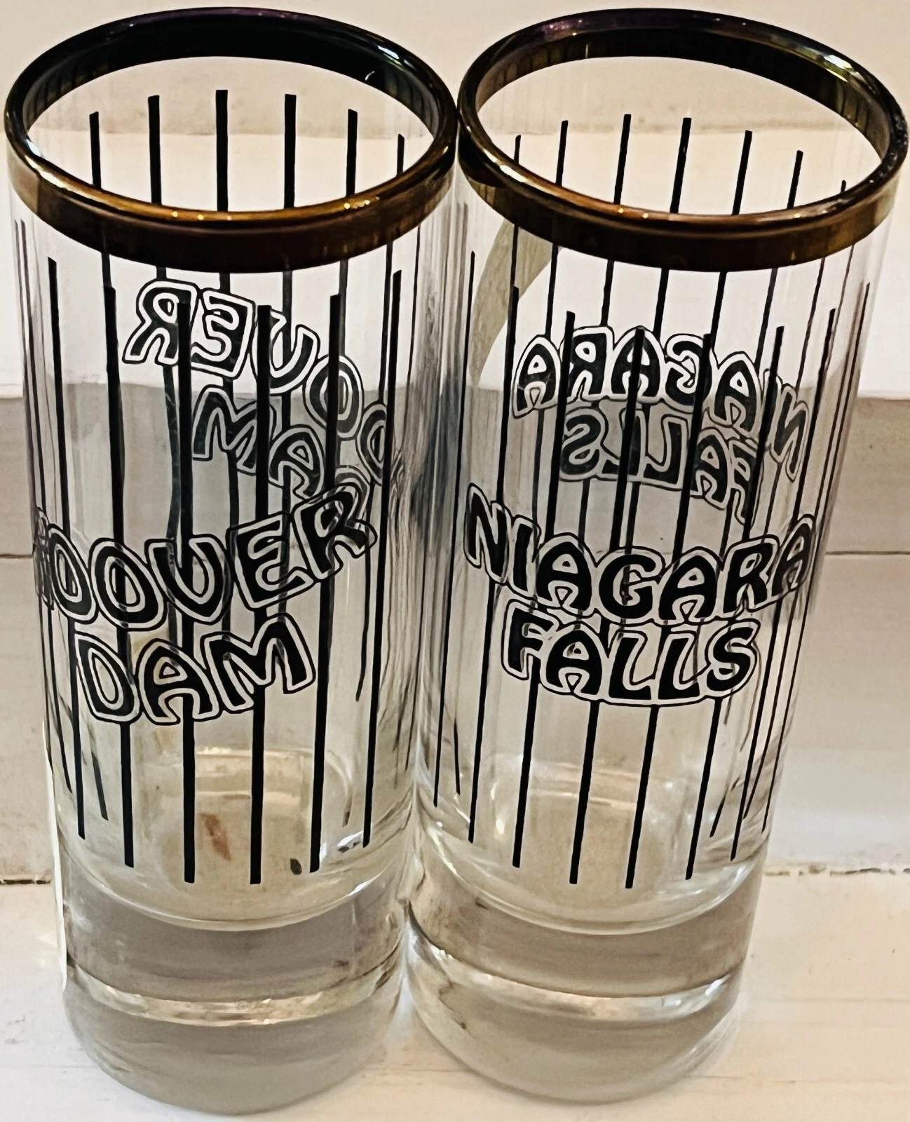 2 Vintage HOOVER DAM & NIAGARA FALLS 4" Tall Shot Glasses with Gold Trim at Rim