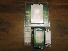 2 Lutron Dimmers , 1 leviton, 1Luminaire Total 4 pcs.