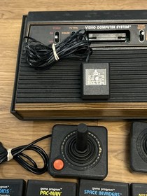Atari 2600 Woodgrain 4 Switch Console w/ 25 Games 2 joysticks Tested Working