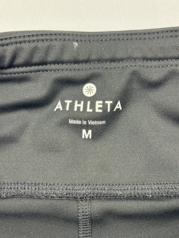 Leggings Athleta para mujer medianos negros recortados malla ribete tiro alto elásticos ropa deportiva Foto 3 de 4