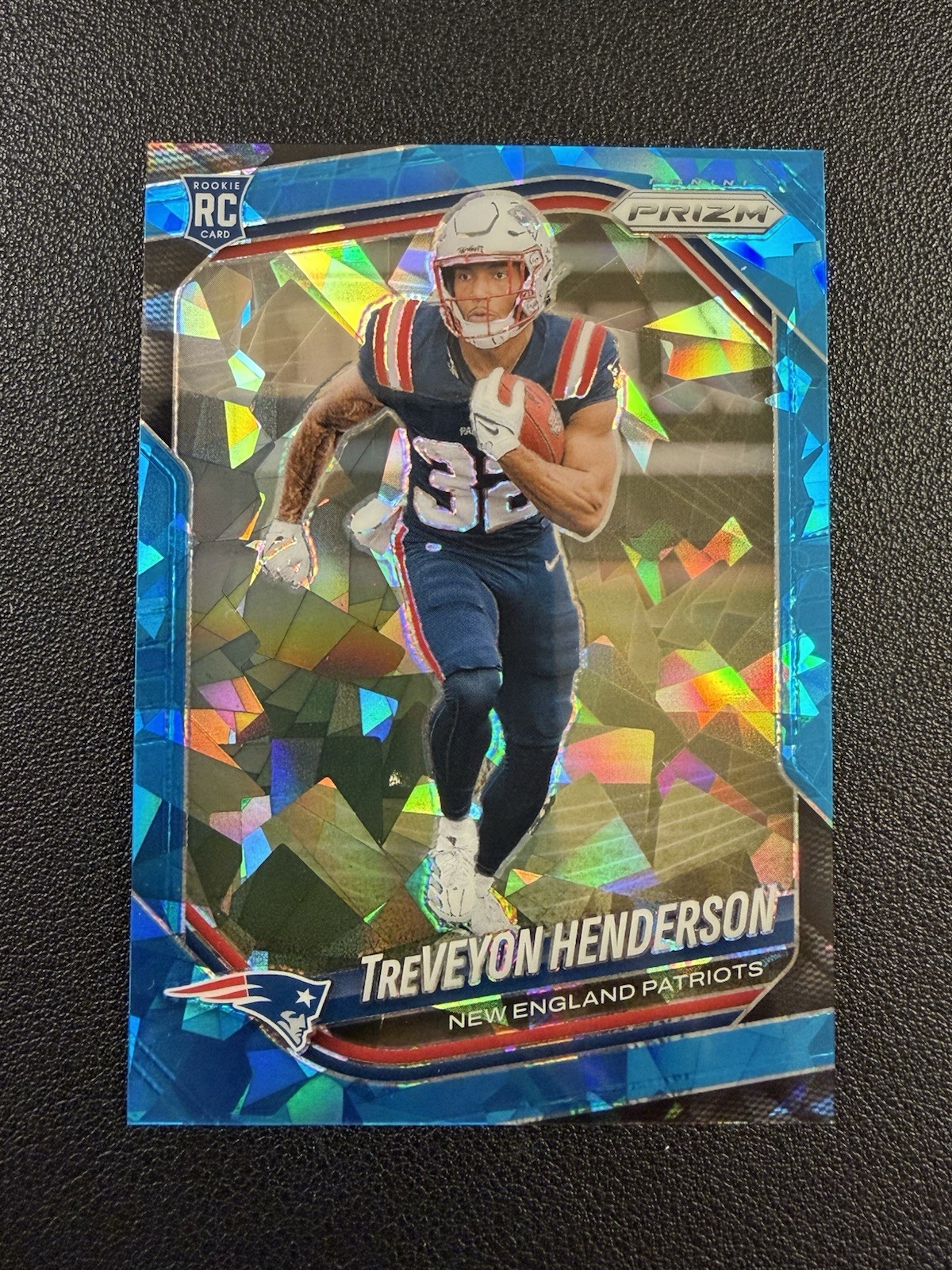 2025 Panini Prizm Treveyon Henderson Blue Ice Prizm Rookie /99 #343 RC Patriots