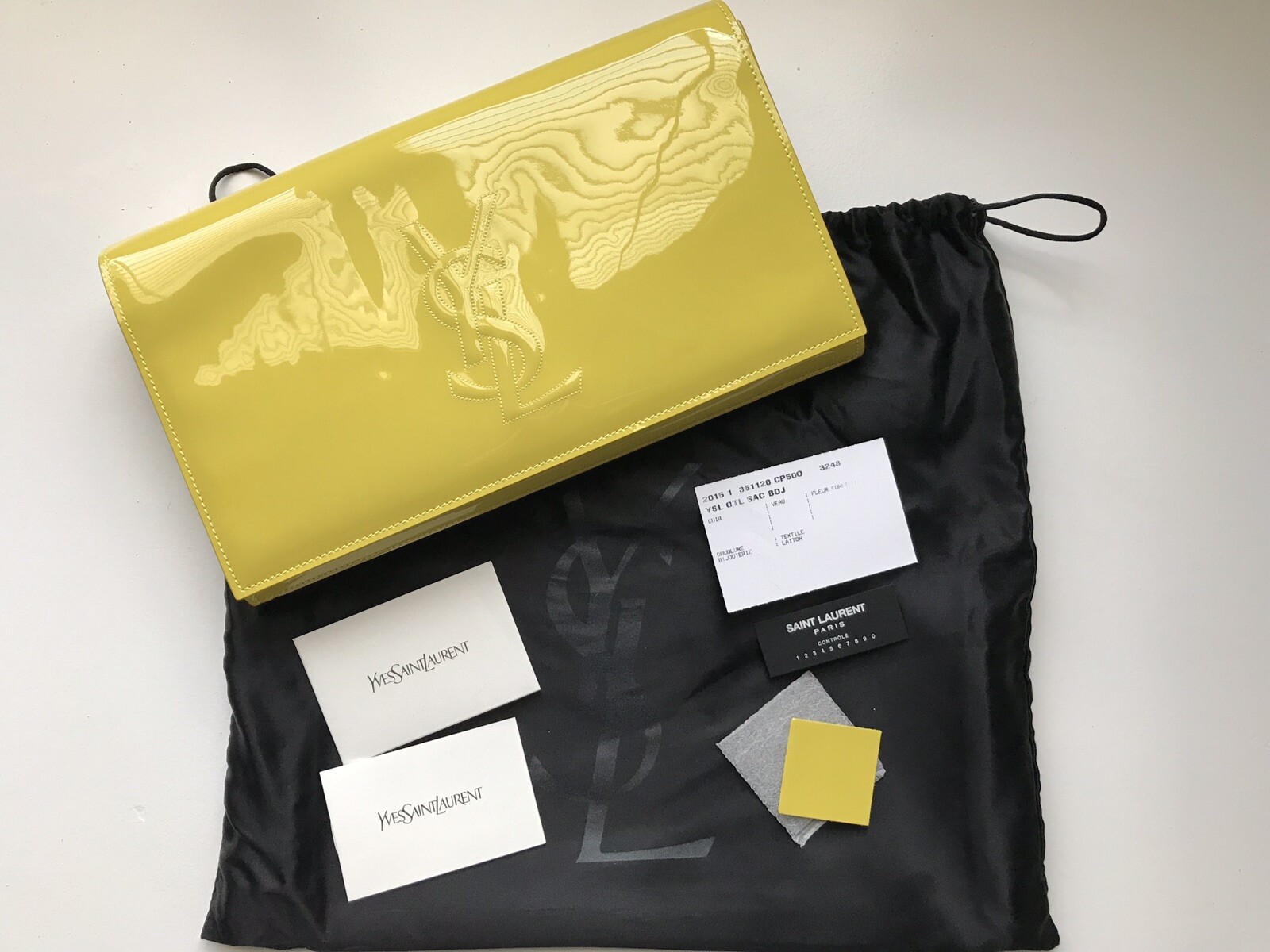 neon ysl clutch
